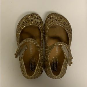 Mini Melissa gold sandals with Velcro strap